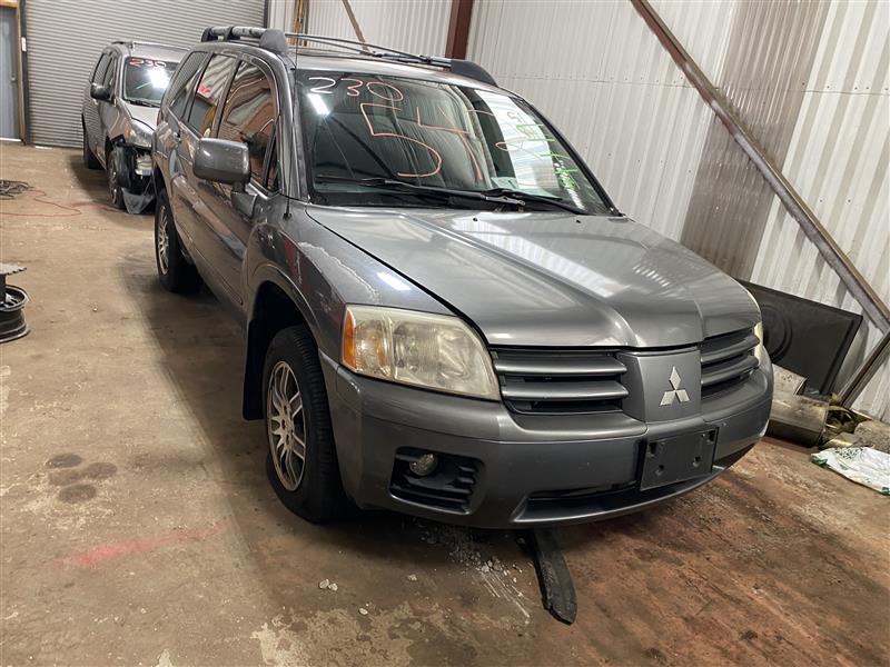 GAS FUEL FILLER LID DOOR Mitsubishi Endeavor 2005 05 - 1325112